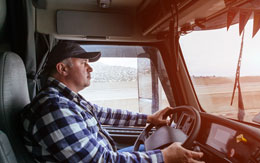 Truck driver in his vehicle